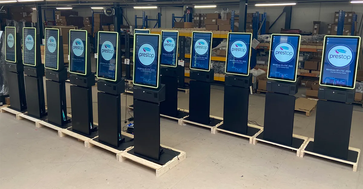 HANOS SHOP order kiosk in the production hall, designed and supplied by Prestop, with customized poster plate and integrated software.