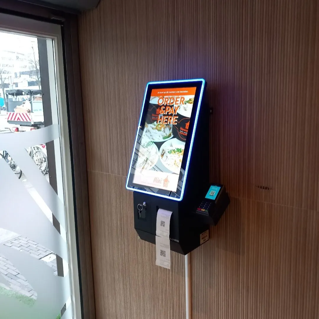 wall and ceiling mounted self-service kiosk