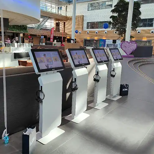 ASML rental information kiosks with headphones