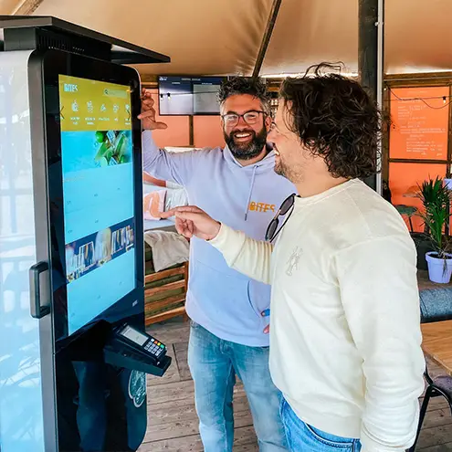 Sheltered outdoor ordering kiosk at campground snack bar in the Netherlands