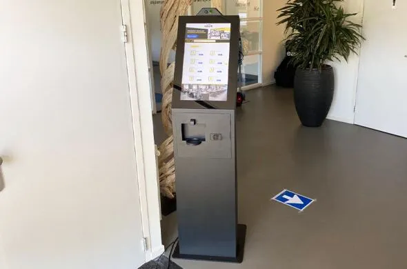 Digital reception with hand sanitizer dispenser at Eazit