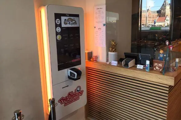 Ordering ramen and merch through the order kiosks at Ramen-Kingdom